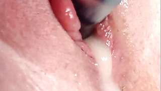 Granny with a big clit and wet pussy has an intense orgasm