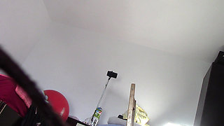 Amateur wife dancing naked at home. Amateur woman has fun trying on clothes and cutting them.