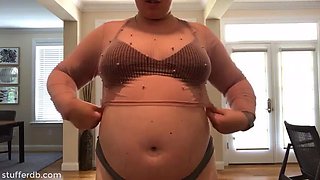 Fatty tries on old clothes