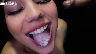Lilith Grace shakes tits while sucking cock through gloryhole
