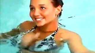 Christina Lucci posing in a pool 2