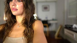 Sexy dance with a busty brunette as she strips and flaunts her perfect body