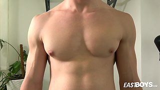 Handsome muscle boy Sean Ross flexing