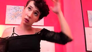 Big tit shemale jerks her long cock