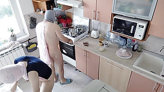 A hot amateur couple having fun in the kitchen.