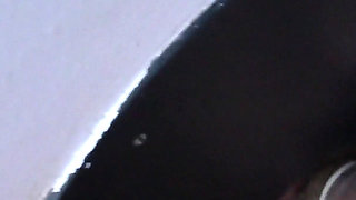 Girlfriend Sucks Condom off Stranger at Glory Hole