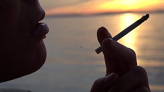 Smoking Cigarettes on the Beach