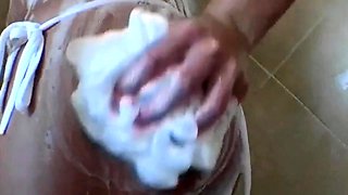Soapy shower teen in close up