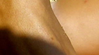 Anal blonde on the rocky beach