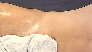 Female Hands Work Deep on His Post-gym Body Birds Eye View