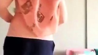Turkish Arab in Hijab and Turban Performs a Striptease