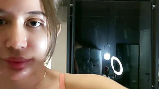 Camgirl plays with her tits and exposing cameltoe perfect indonesian pussy