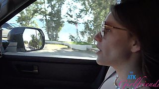 Beautiful woman with glasses has sex in her car