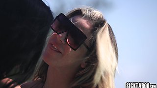 Two lusty lesbians making out outdoor