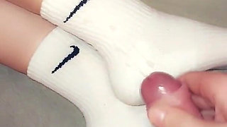 Footjob in Long Socks and Cums on Socks