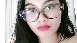 Woman wearing cleavage glasses