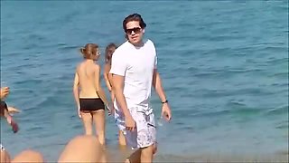 Woman Nude on Public Beach