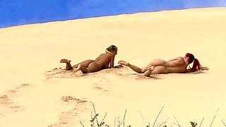 Lesbian masseuse rubs gorgeous babe outdoors in hi def