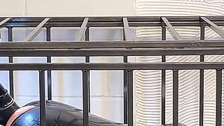 Anal Stretching a Caged Gimp