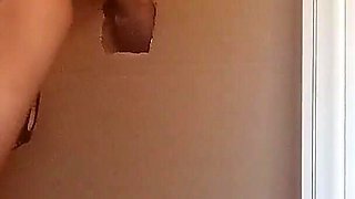 In a Nylon Catsuit and High Heels I Suck a Cock and Fuck It in a Gloryhole Until It Cums in My Mouth