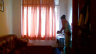 my new Indian maid cleaning my room