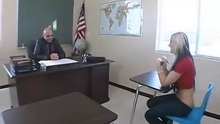 Sexy blonde teen lays on desk and get fucked by her teacher