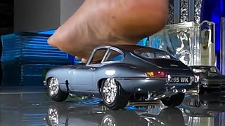 Merciless femdom mistress crushing toy cars barefoot