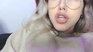 Petite Blonde with Glasses fingering her pussy