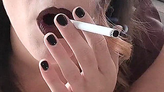 Smoking in Sexy Black Lingerie with Suspenders