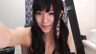 Hot busty Korean babe masturbates
