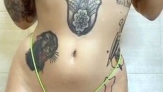 Busty babe playing with her big boobs