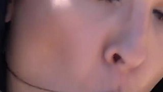 Lovely brunette is masturbating by the sea