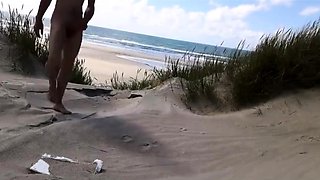 Exhibitionist Strokes Hard on the Beach
