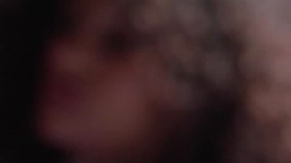 Curly hair hispanic posing in lingerie