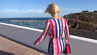 Blonde Flashing On A Windy Day