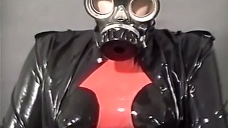 Insane fetish action with two sluts in latex body and gasmasks