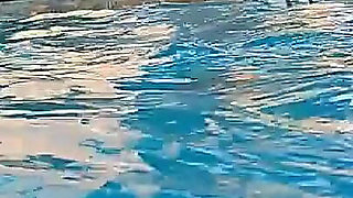 Couple Underwater Diving and Swimming