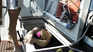 Sub girl lets her friend punish her on his boat