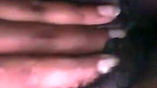Ebony masturbating his pussy with fingers