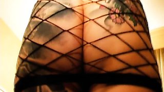 Hot Asian lady in fishnets has a dark stud banging her holes