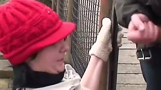 Brunette fucking with old dude next to a railway