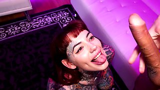 Tattooed hussy Tiger Lilly pleasures her man on the sofa