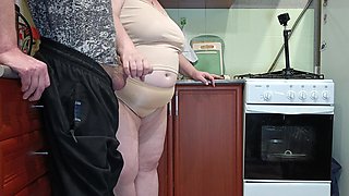 Dick Jerking in the Kitchen and Hot Cum in Stepmom's Mouth