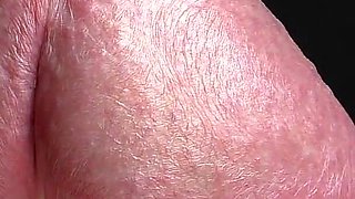Glans Game with White Latex Gloves in Super-closeup