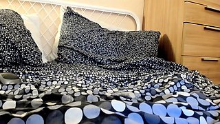 Cleaning up the bed after she pumps herself full of dildo cum