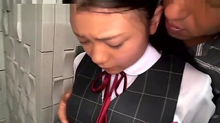 Japanese big tits schoolgirl with pigtails takes a cock inside her mouth