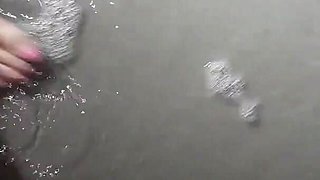 Beach Feet Covered in Wet Sand