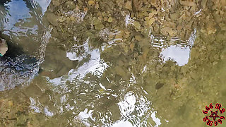 Pissing and cum on her face at the creek