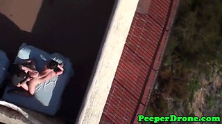 Drone films rooftop sex