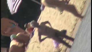 Naked tourists caught on beach spy cam relaxing and enjoying nudity